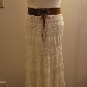White lace long line skirt with brown contrasting belt waistband